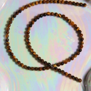 Perle Œil de tigre en pierre naturelle sur fil 4mm