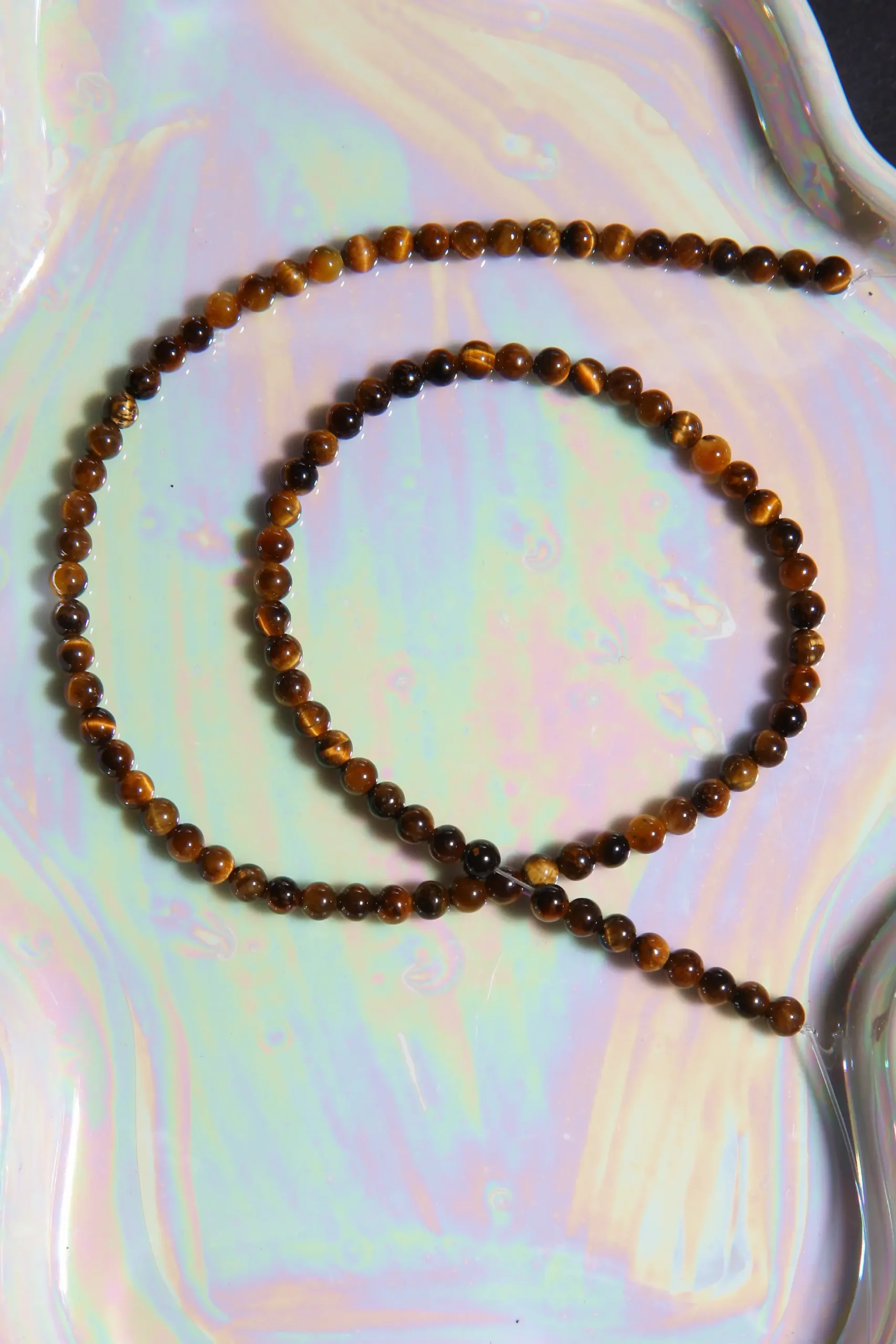 Perle Œil de tigre en pierre naturelle sur fil 4mm