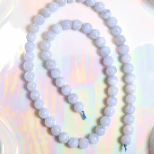 Perle calcédoine bleue 6 mm en pierre naturelle sur fil