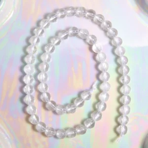 Perle Cristal de roche 6 mm en pierre naturelle sur fil