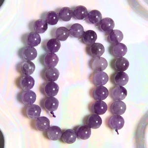 Perle Améthyste calire 10 mm en pierre naturelle sur fil