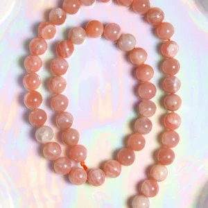 Perle pierre de soleil 8 mm en pierre naturelle sur fil