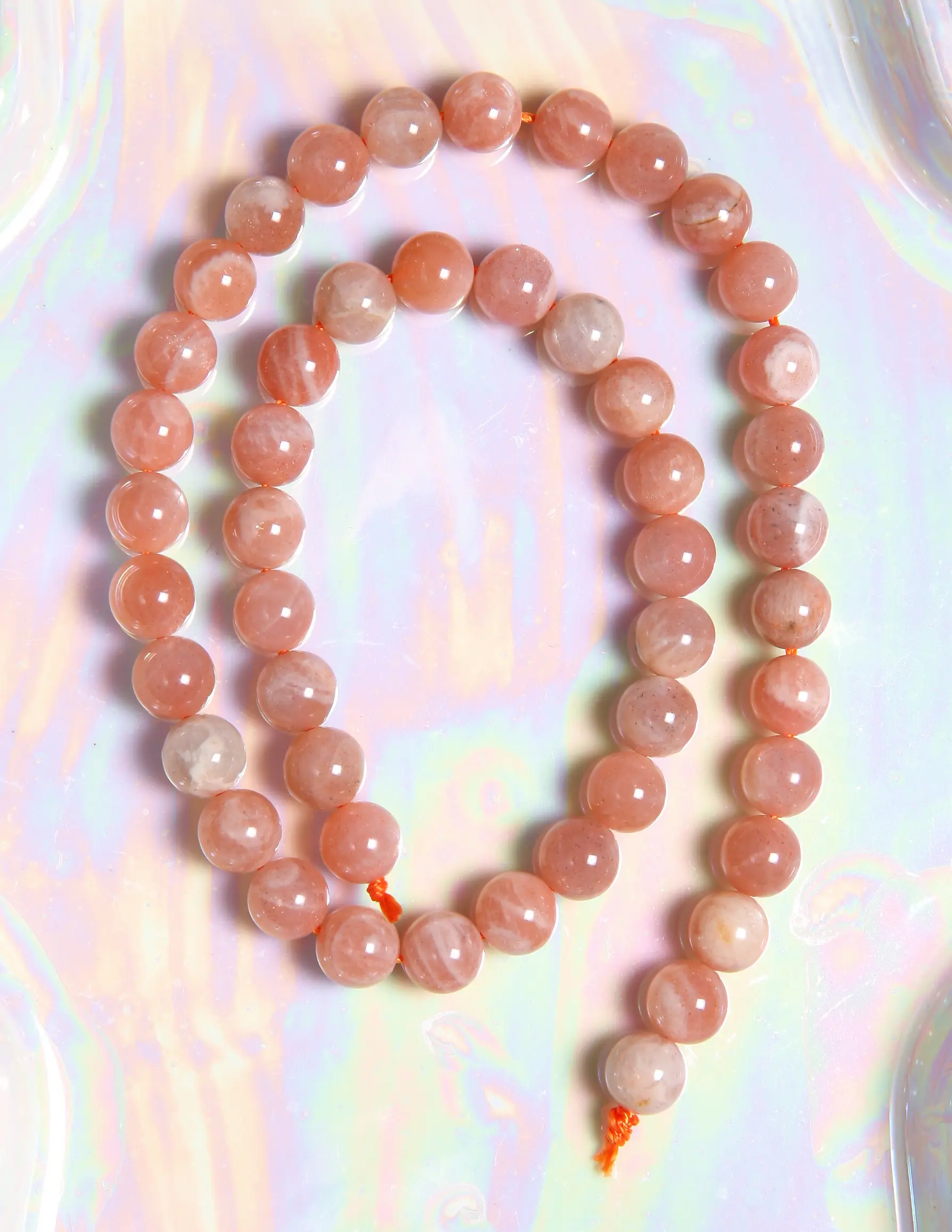 Perle pierre de soleil 8 mm en pierre naturelle sur fil