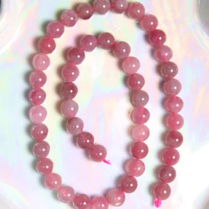 Perle Quartz rose violet 8 mm en pierre naturelle sur fil