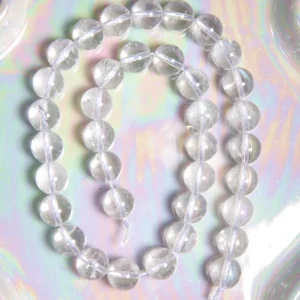 Perle cristal de roche 10mm en pierre naturelle sur fil-1