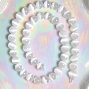 Perle sélénite 8 mm en pierre naturelle sur fil