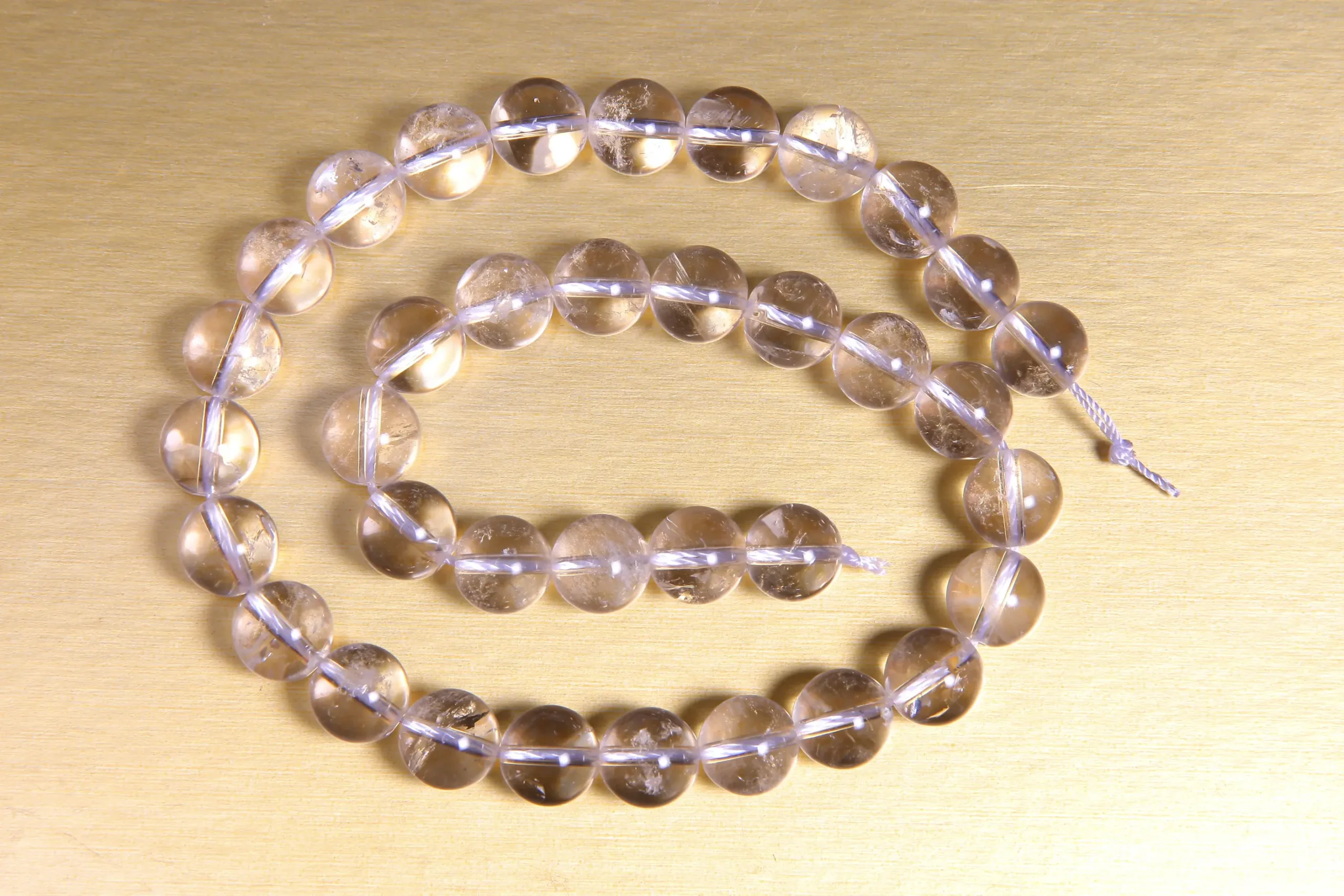 Perle cristal de roche 10mm en pierre naturelle sur fil-2