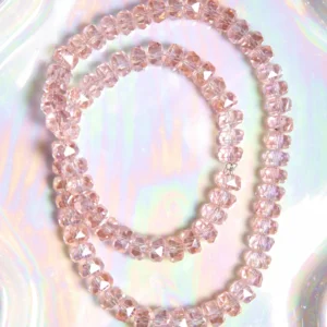 Perle Cristal facetté rose 8x6 mm en verre