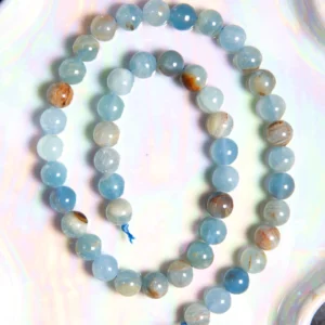 Perle calcite bleue 8 mm en pierre naturelle sur fil
