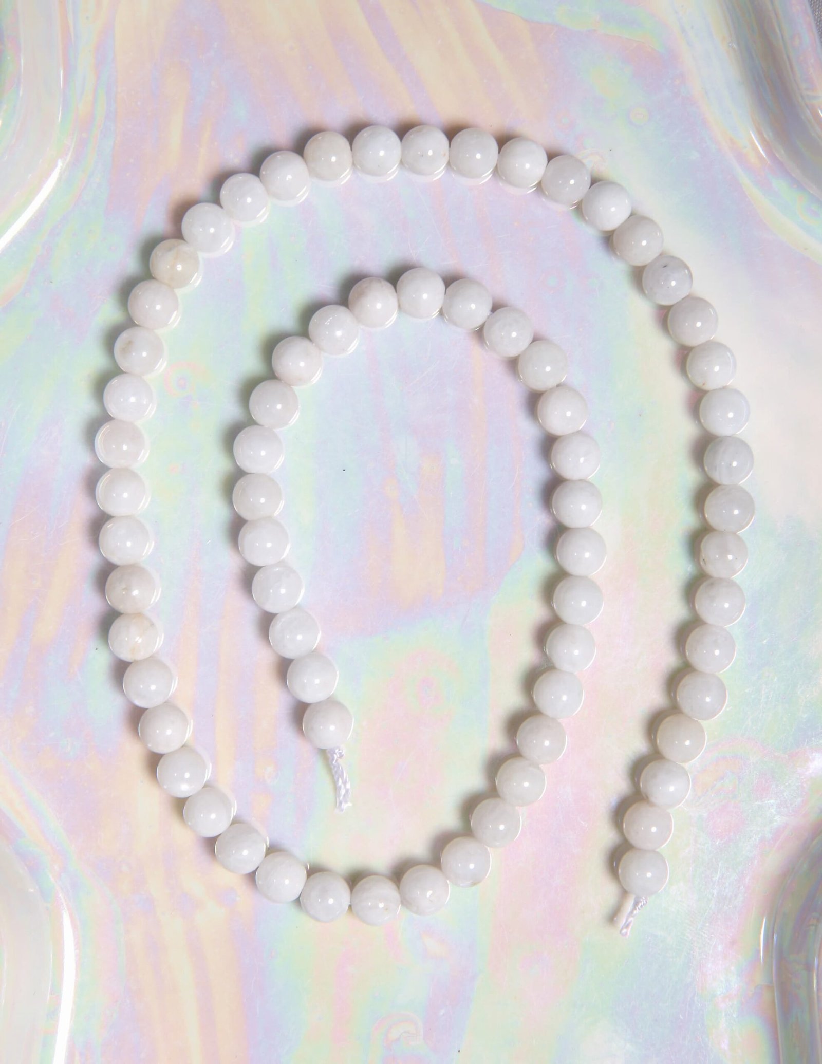 Perle Pierre de lune 6 mm en pierre naturelle sur fil